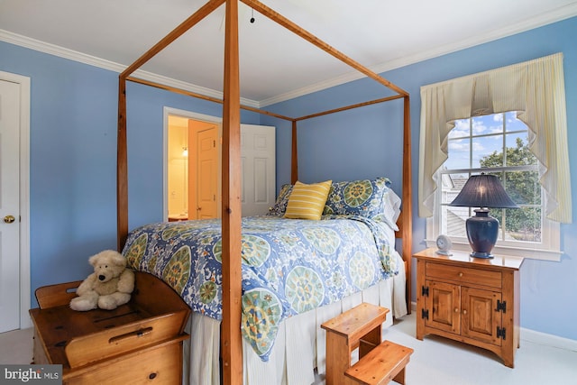 carpeted bedroom with crown molding