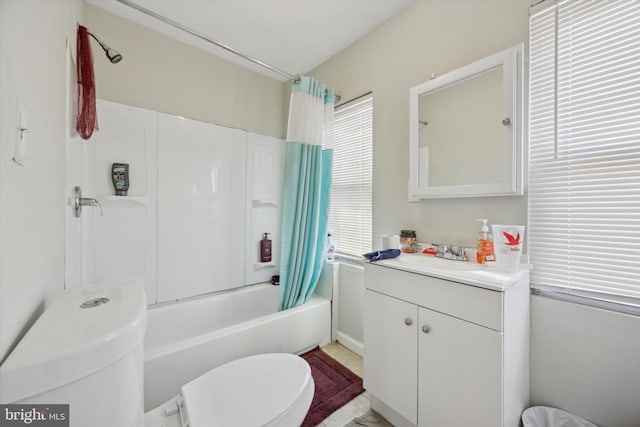 full bathroom featuring vanity, toilet, and shower / bath combo