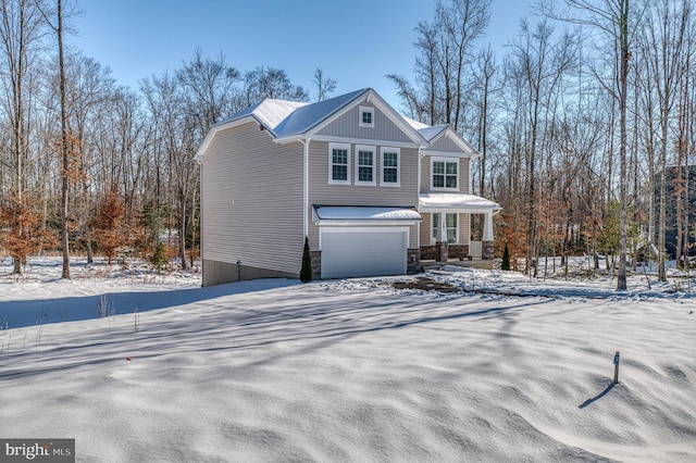 view of front of home with a garage