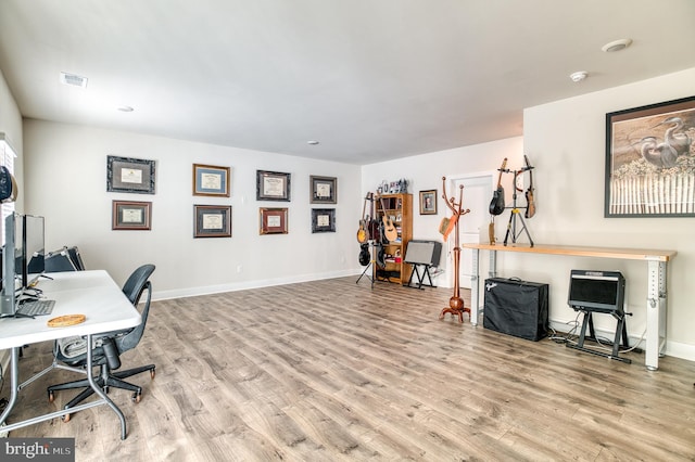 home office featuring light hardwood / wood-style floors