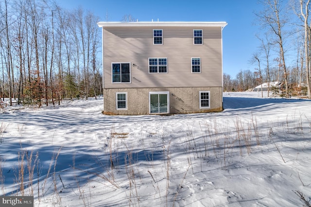 view of snow covered property