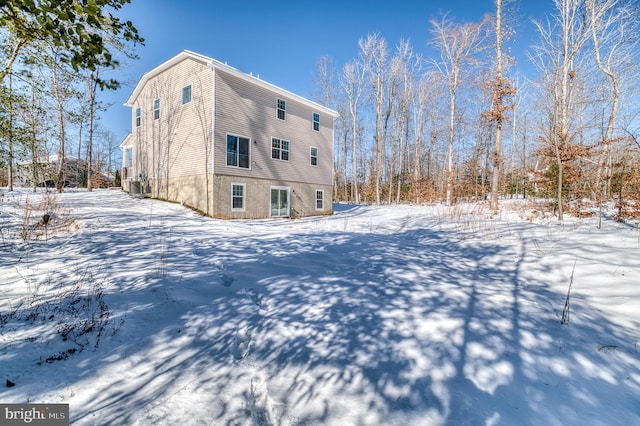 view of snow covered property