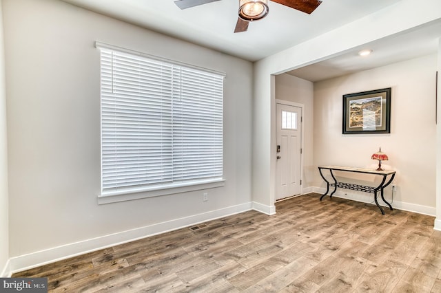 entrance foyer featuring ceiling fan and light hardwood / wood-style flooring