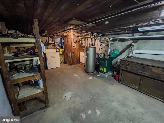 basement with washer / clothes dryer and water heater