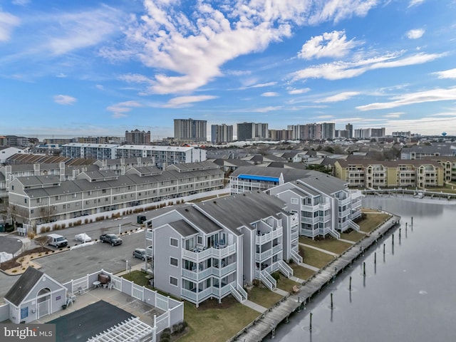 birds eye view of property featuring a water view