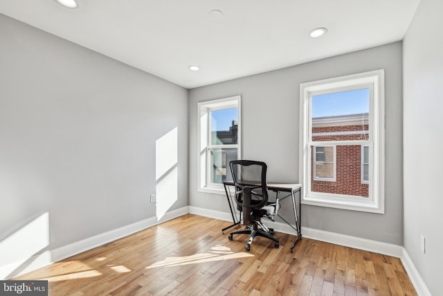 office space featuring hardwood / wood-style floors