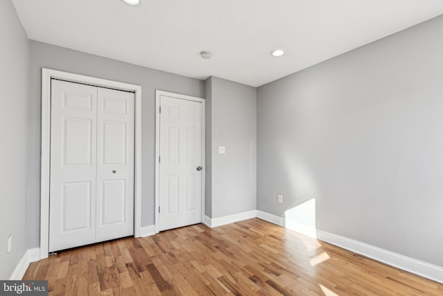 unfurnished bedroom featuring light hardwood / wood-style floors