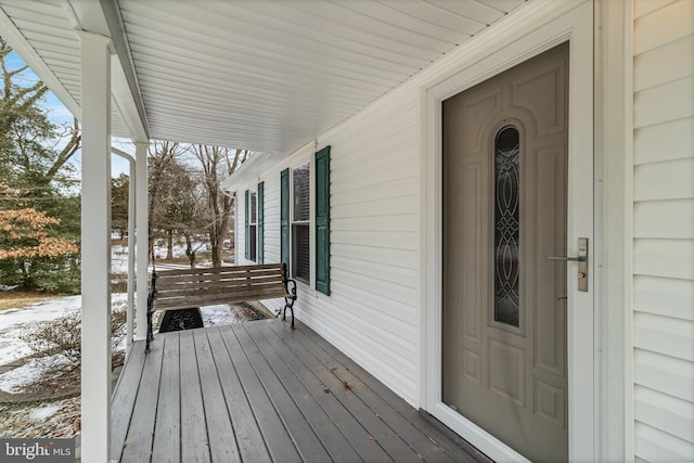 view of snow covered deck