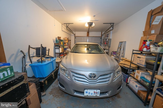 garage featuring a garage door opener