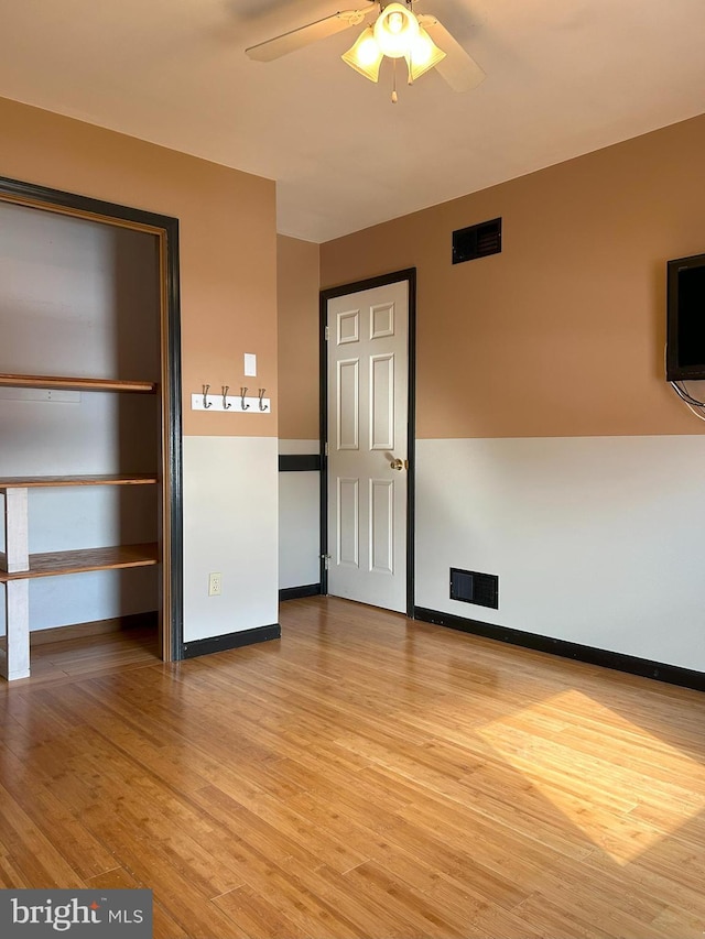 interior space featuring ceiling fan and light wood-type flooring