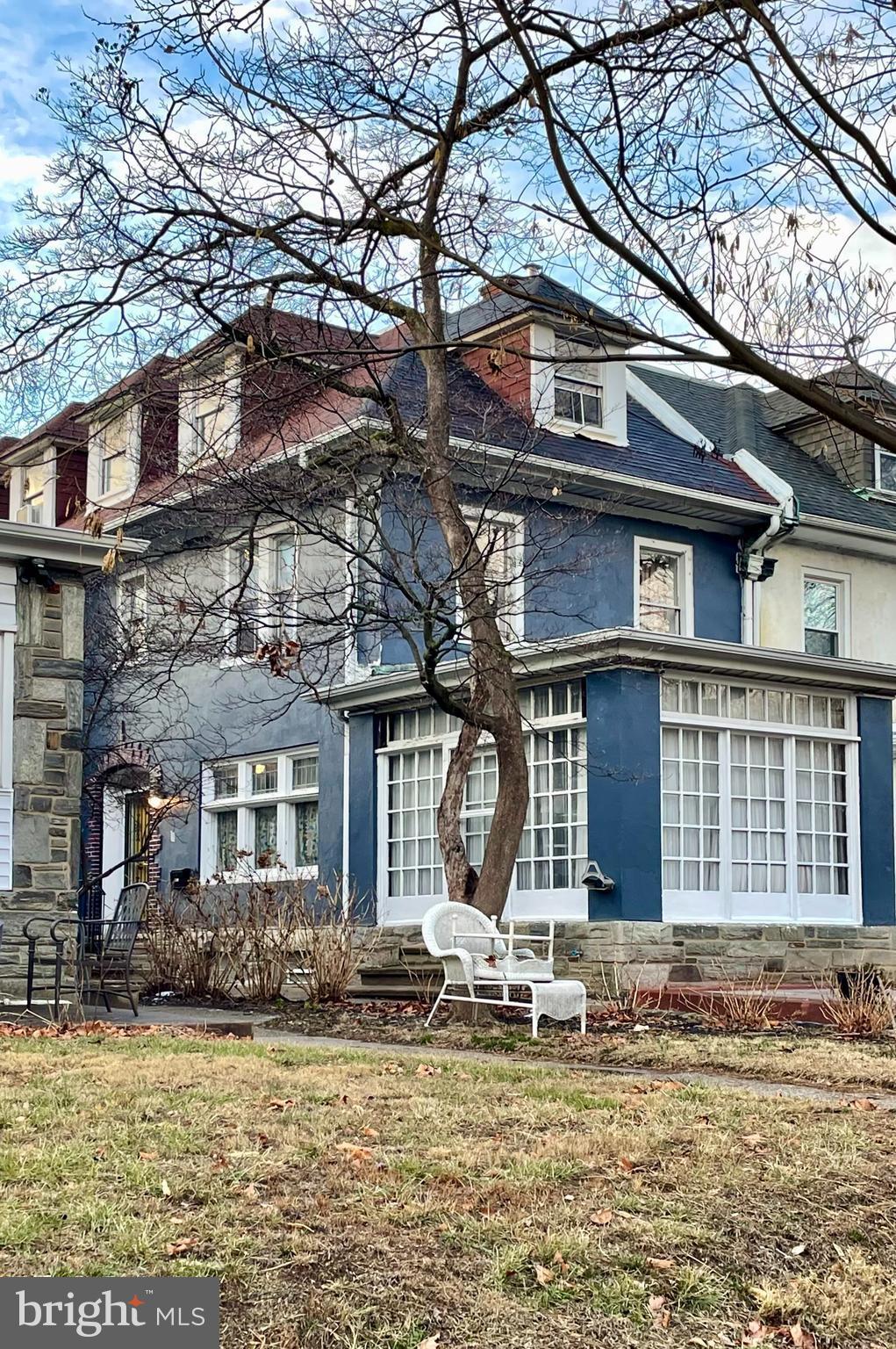 back of house featuring a yard