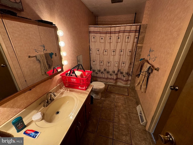1941 Cedar Dr, Spring Grove, PA 17362 - bathroom with vanity, a textured wall, tile patterned flooring, and a shower with curtain