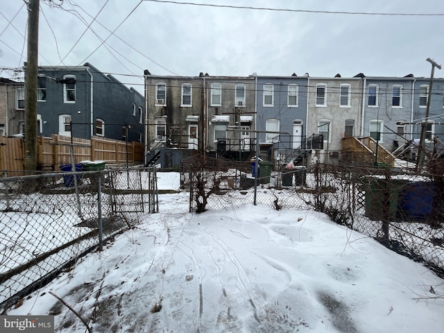 view of yard layered in snow