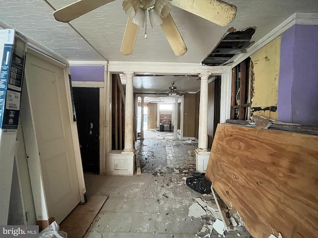 misc room featuring decorative columns and ceiling fan