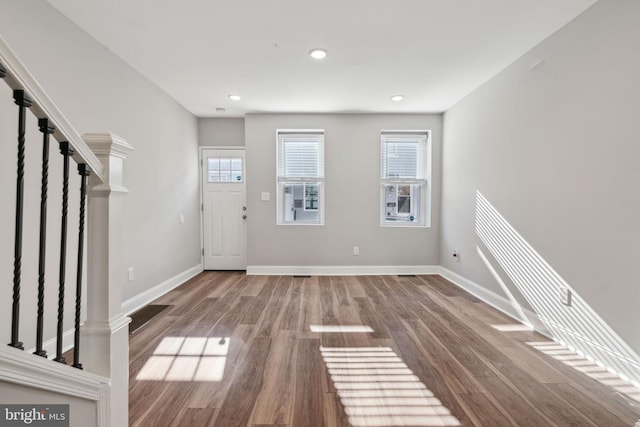 foyer with hardwood / wood-style flooring