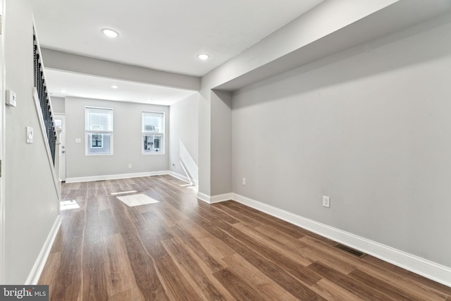 basement featuring wood-type flooring