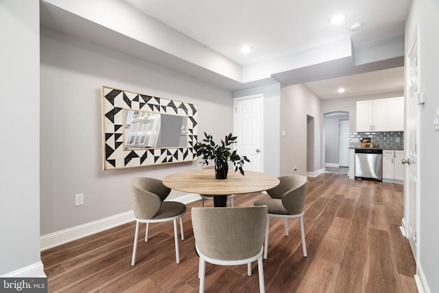 dining area featuring hardwood / wood-style flooring