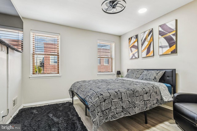 bedroom featuring hardwood / wood-style flooring