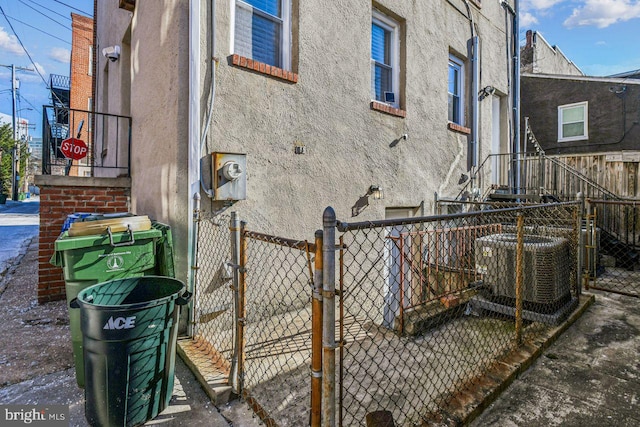 view of side of property with cooling unit