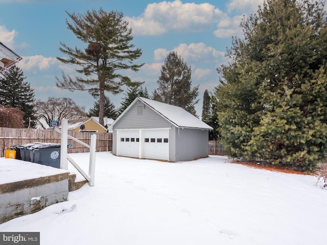 view of snow covered garage