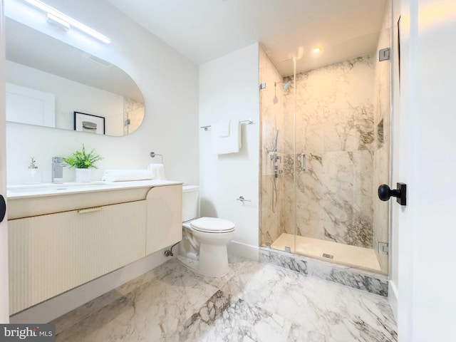 bathroom with toilet, an enclosed shower, and vanity