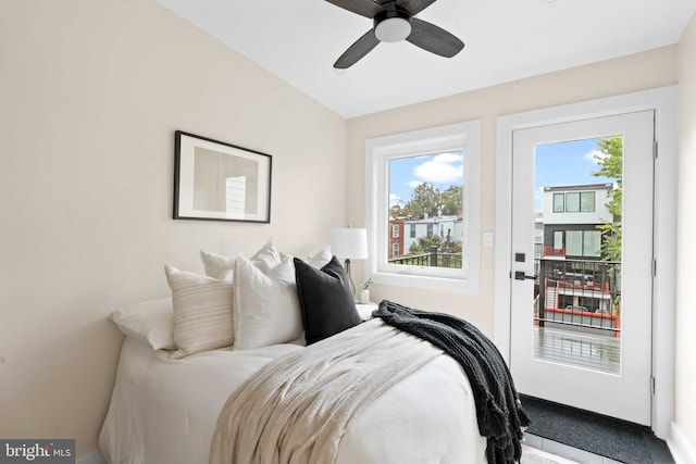 bedroom with ceiling fan and vaulted ceiling