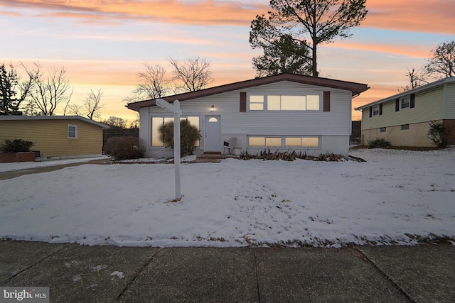 view of snow covered house