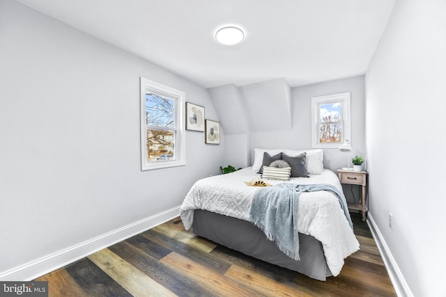 bedroom featuring dark wood-type flooring