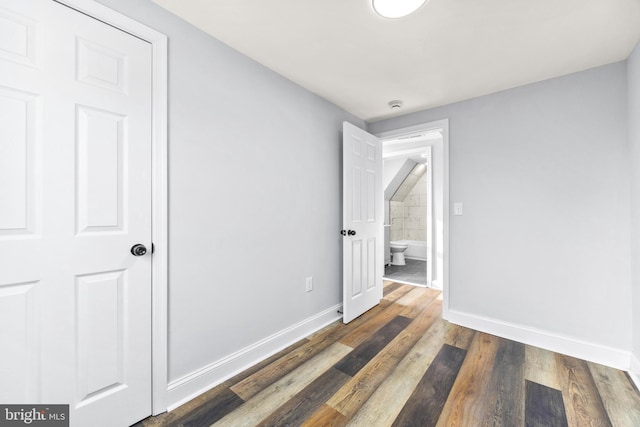 interior space with dark hardwood / wood-style flooring