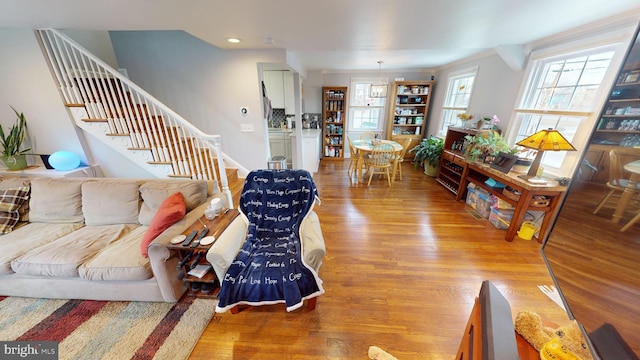 living room with light hardwood / wood-style flooring