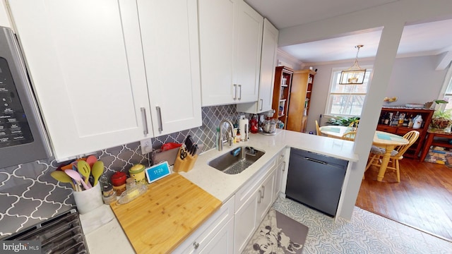 kitchen featuring ornamental molding, black dishwasher, sink, and white cabinets