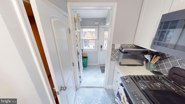 mudroom featuring light tile patterned floors