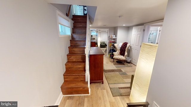 stairway with wood-type flooring