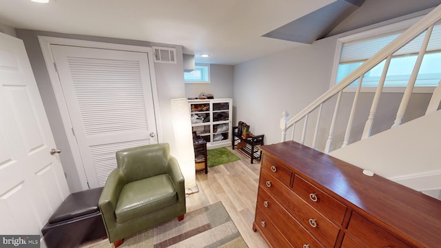 sitting room with light hardwood / wood-style flooring