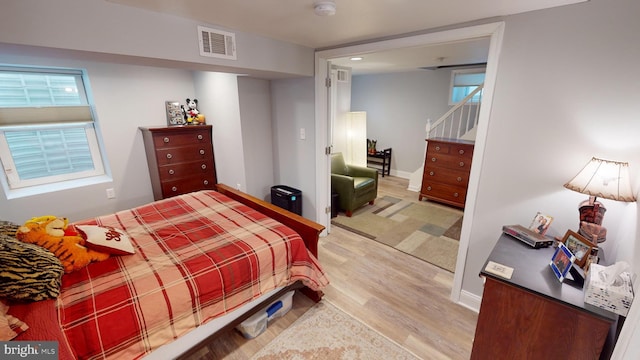 bedroom featuring hardwood / wood-style floors