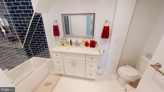 full bathroom with tile patterned floors, vanity, toilet, and tiled shower / bath combo