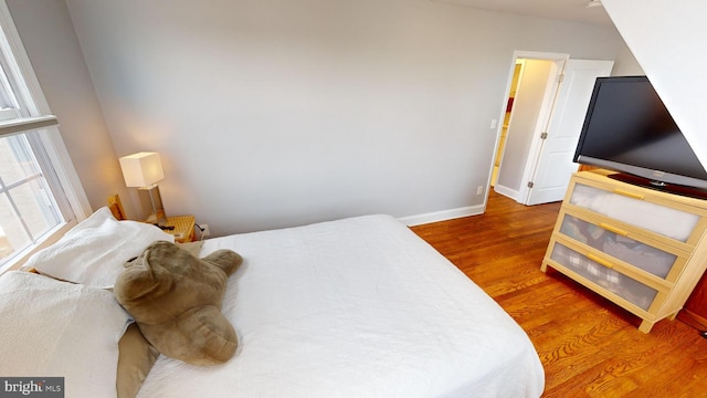 bedroom featuring hardwood / wood-style floors