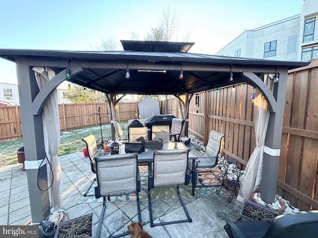 view of patio featuring a gazebo