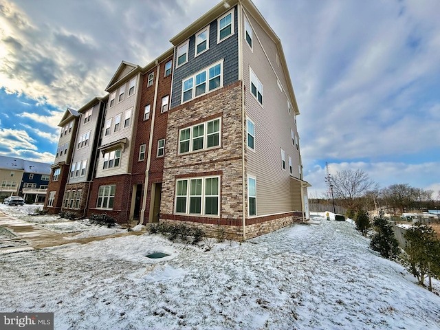 view of snow covered property