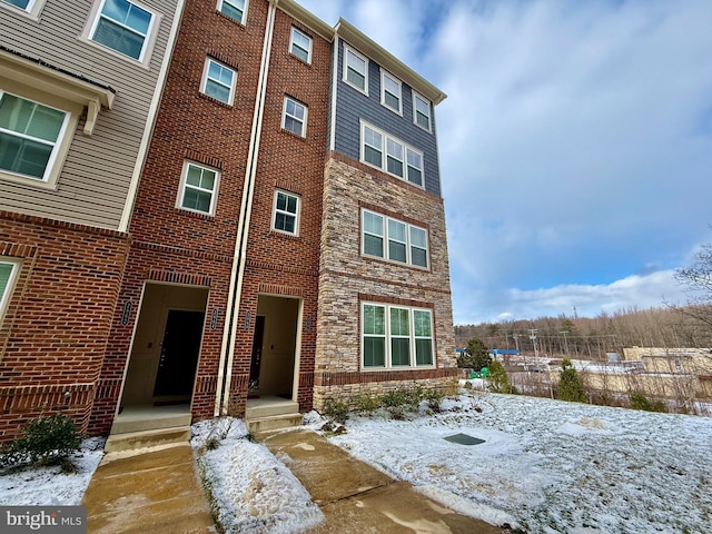 view of snow covered building