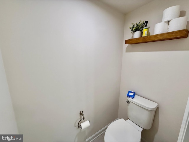 bathroom featuring toilet