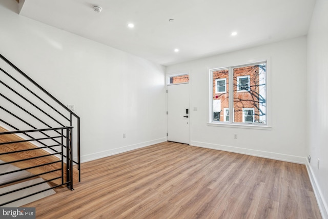 foyer entrance featuring light hardwood / wood-style floors