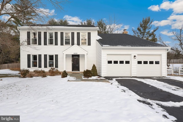 view of front of property with a garage