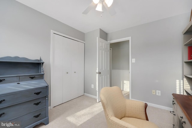 office featuring light colored carpet and ceiling fan