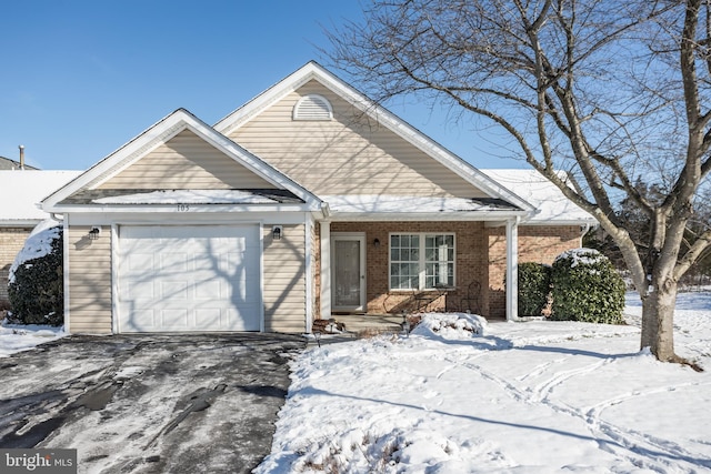 view of front of property featuring a garage