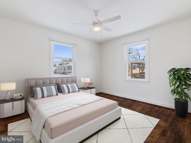 bedroom featuring ceiling fan and hardwood / wood-style flooring