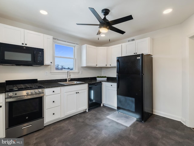 kitchen with black appliances, ceiling fan, white cabinetry, and sink