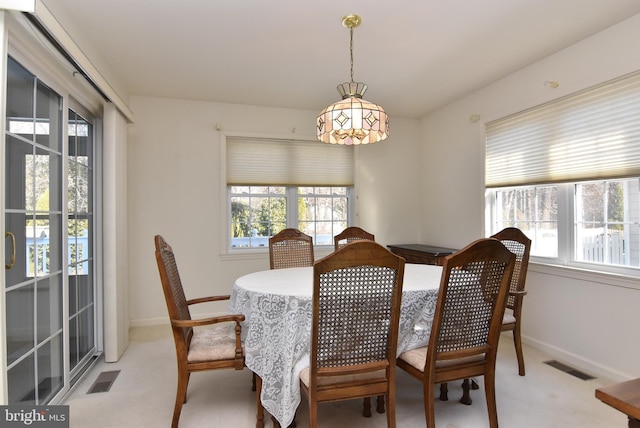 view of carpeted dining room