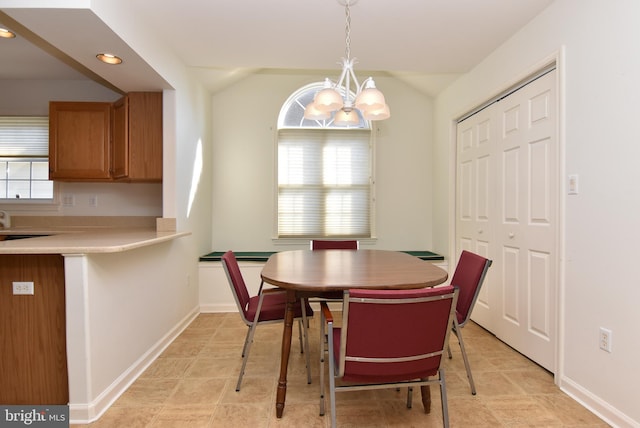 dining room featuring a chandelier