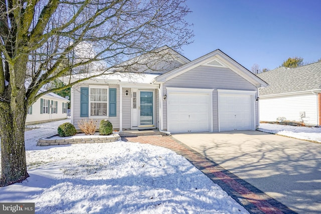 ranch-style home featuring a garage